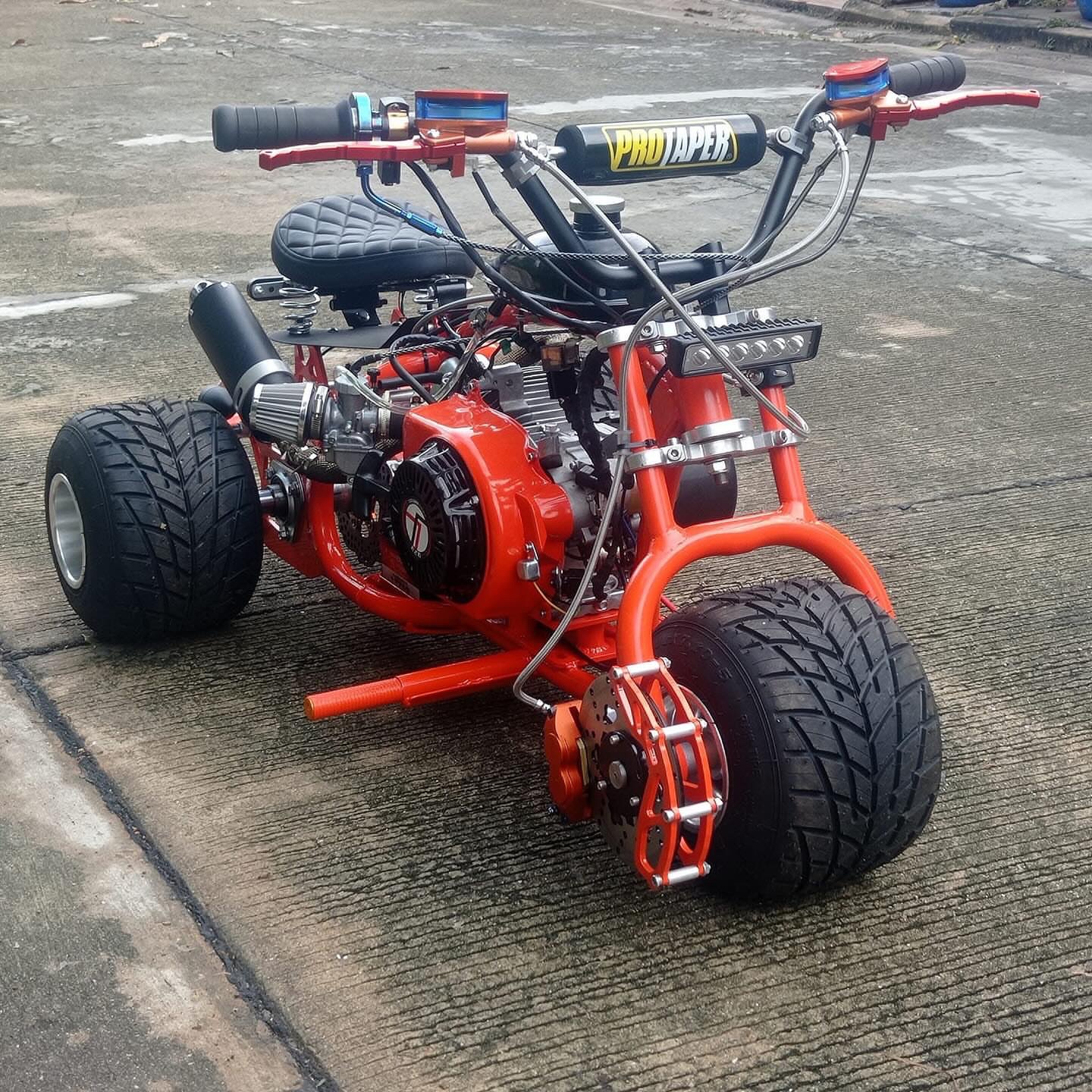 snaptik_7483905121345162551_0 Orange custom mini trike - Image 1